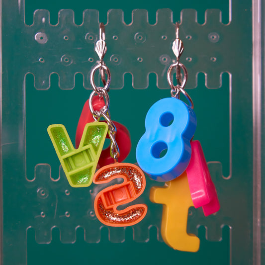 Mixed alphabet dangle earrings